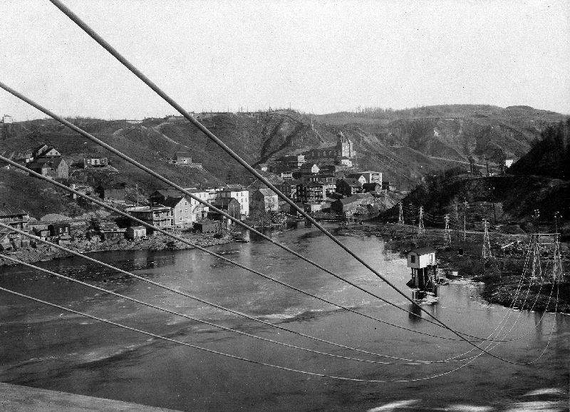 A high-voltage power line leaving the Shawinigan-2 and crossing over the Saint-Maurice River