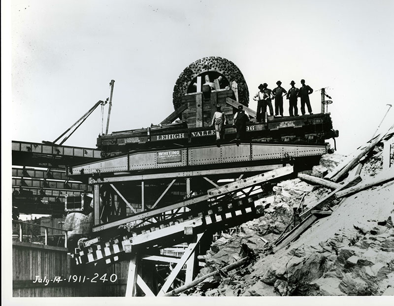 Workers standing on the platform of the funicular of the Shawinigan-2 generating station