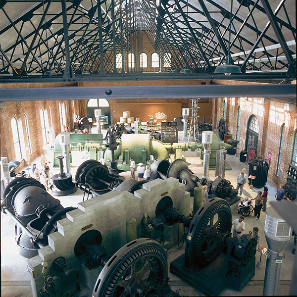 Visitors touring objects on exhibit at the N.A.C. generating station