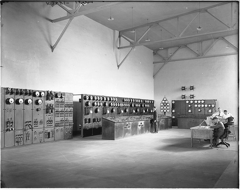 Operators monitoring operations in the control room at the Grand-Mère Generating Station