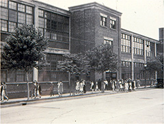 Employees leaving the Wabasso Cotton Company on Rue de la Station